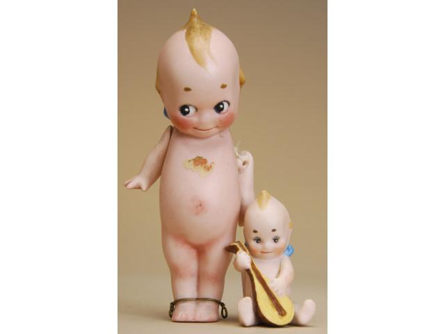 Appraisal: Lot Two Rose O'Neill Kewpies Germany ca the first an