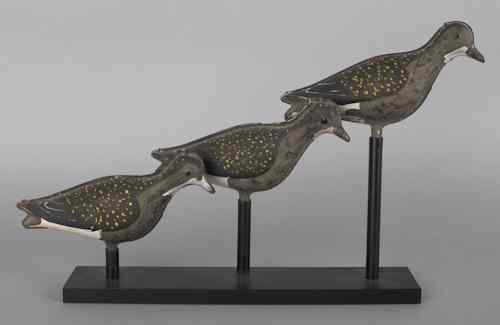 Appraisal: Three painted tin dove decoys early th c