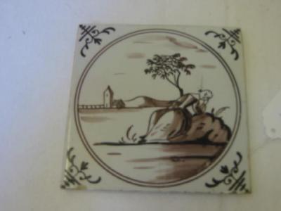 Appraisal: AN EARLY DELFT TILE painted in manganese with a lady