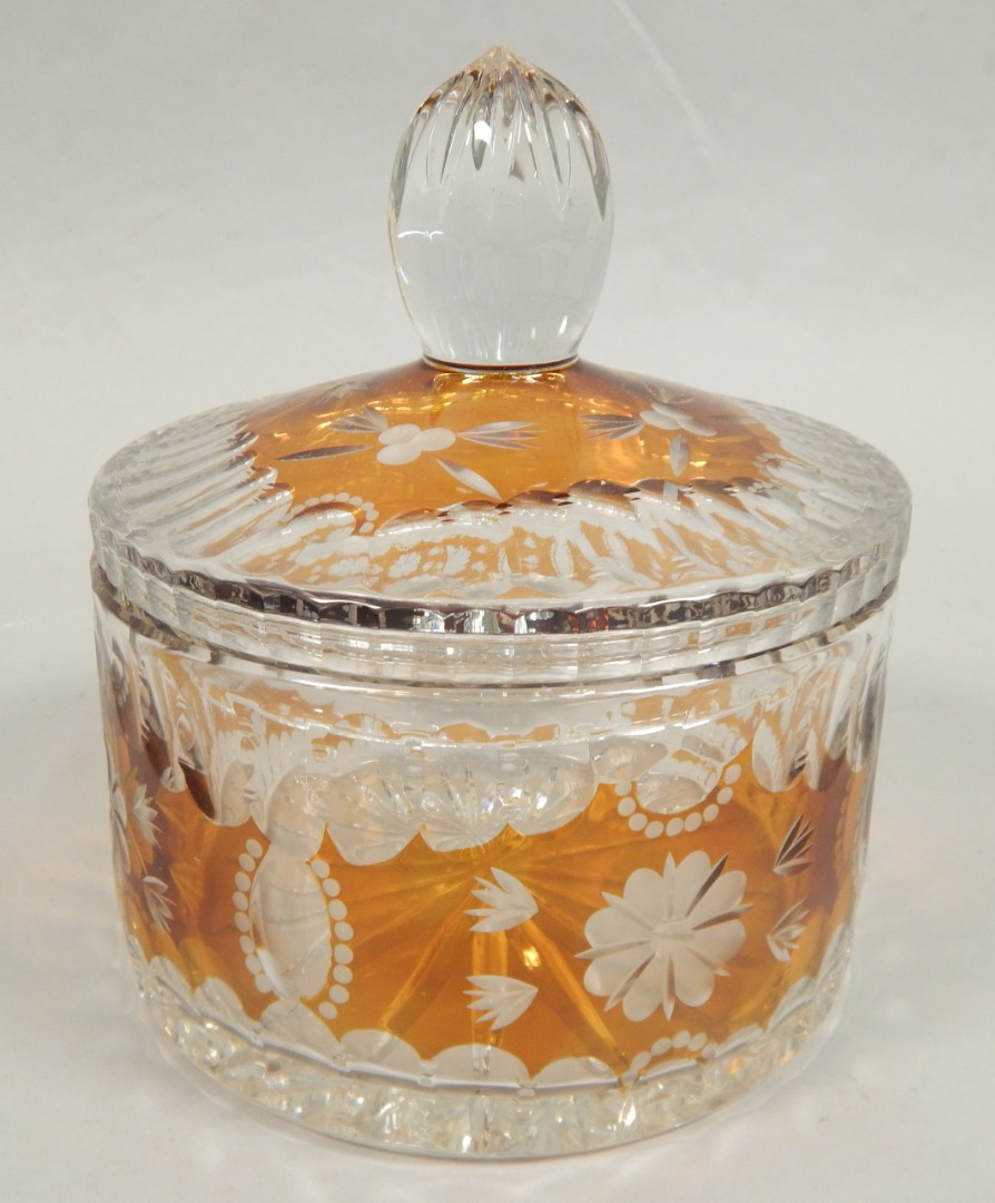 Appraisal: A modern Bohemian style amber flash jar and cover with