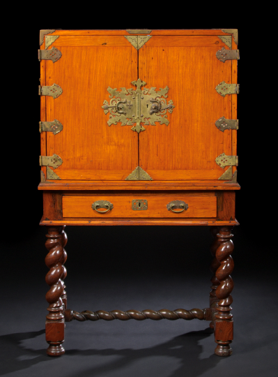 Appraisal: Anglo-Colonial Mahogany Cabinet-on-Stand fourth quarter th century the brass-bound case