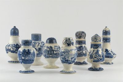 Appraisal: Eight blue and white casters seven printed with Oriental landscapes