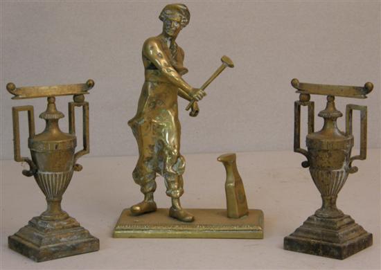 Appraisal: Twentieth century brass figure a man holding a hammer by