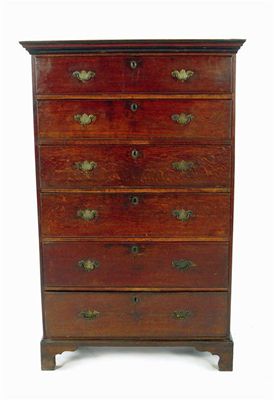 Appraisal: A late George III oak tall chest the moulded cornice