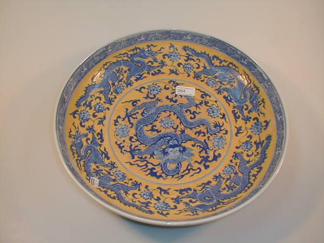 Appraisal: A modern Chinese saucer dish painted in blue with an