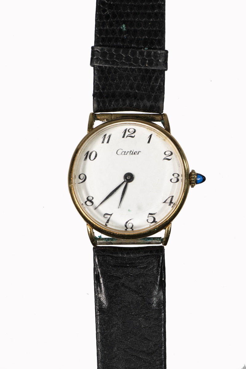 Appraisal: K YELLOW GOLD MEN'S CARTIER WRISTWATCH c round head black