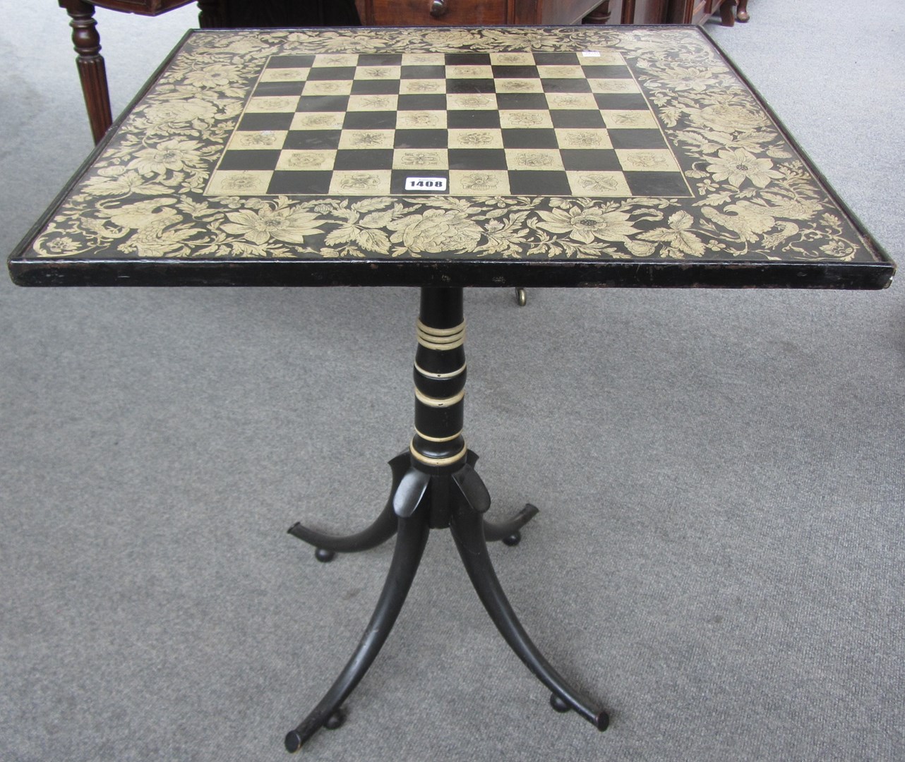 Appraisal: An early th century ebonised occasional table the square top