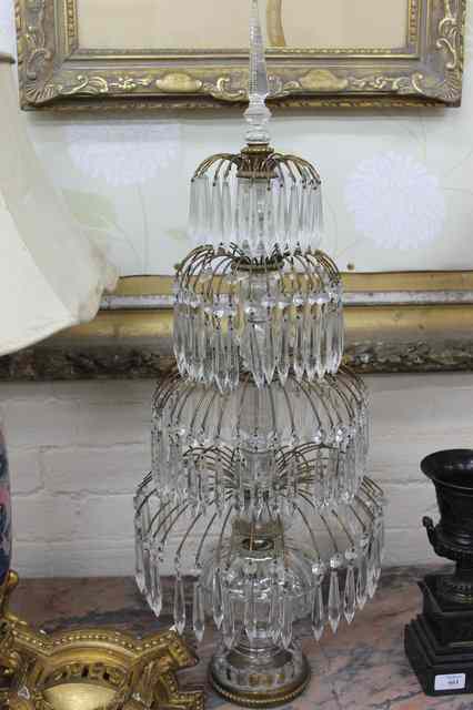 Appraisal: A TABLE LAMP with cut glass drops in the form