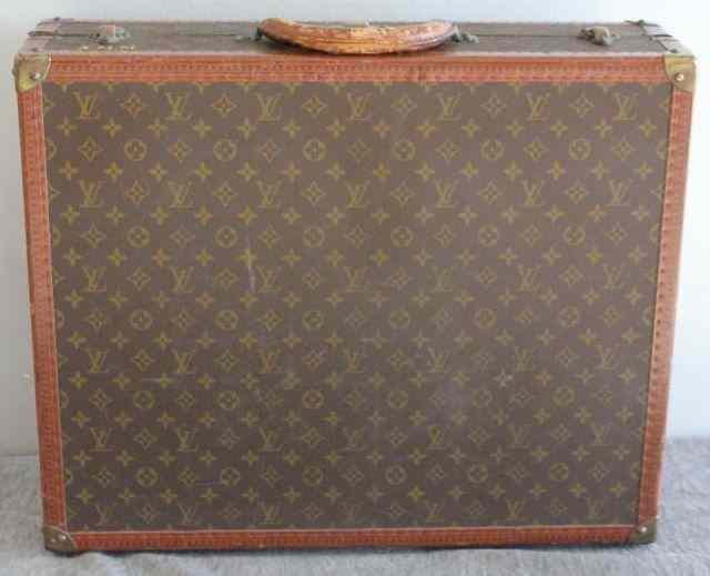 Appraisal: Louis Vuitton Vintage SuitcaseClean interior with scuff marks on exterior