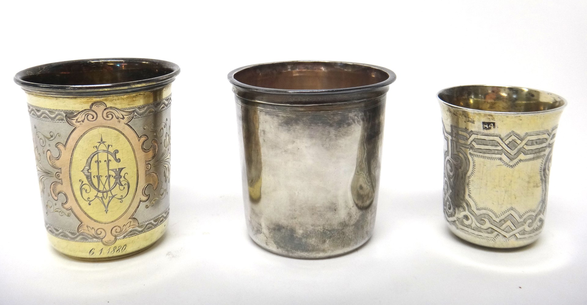 Appraisal: A European parcel gilt beaker with engraved decoration detailed a