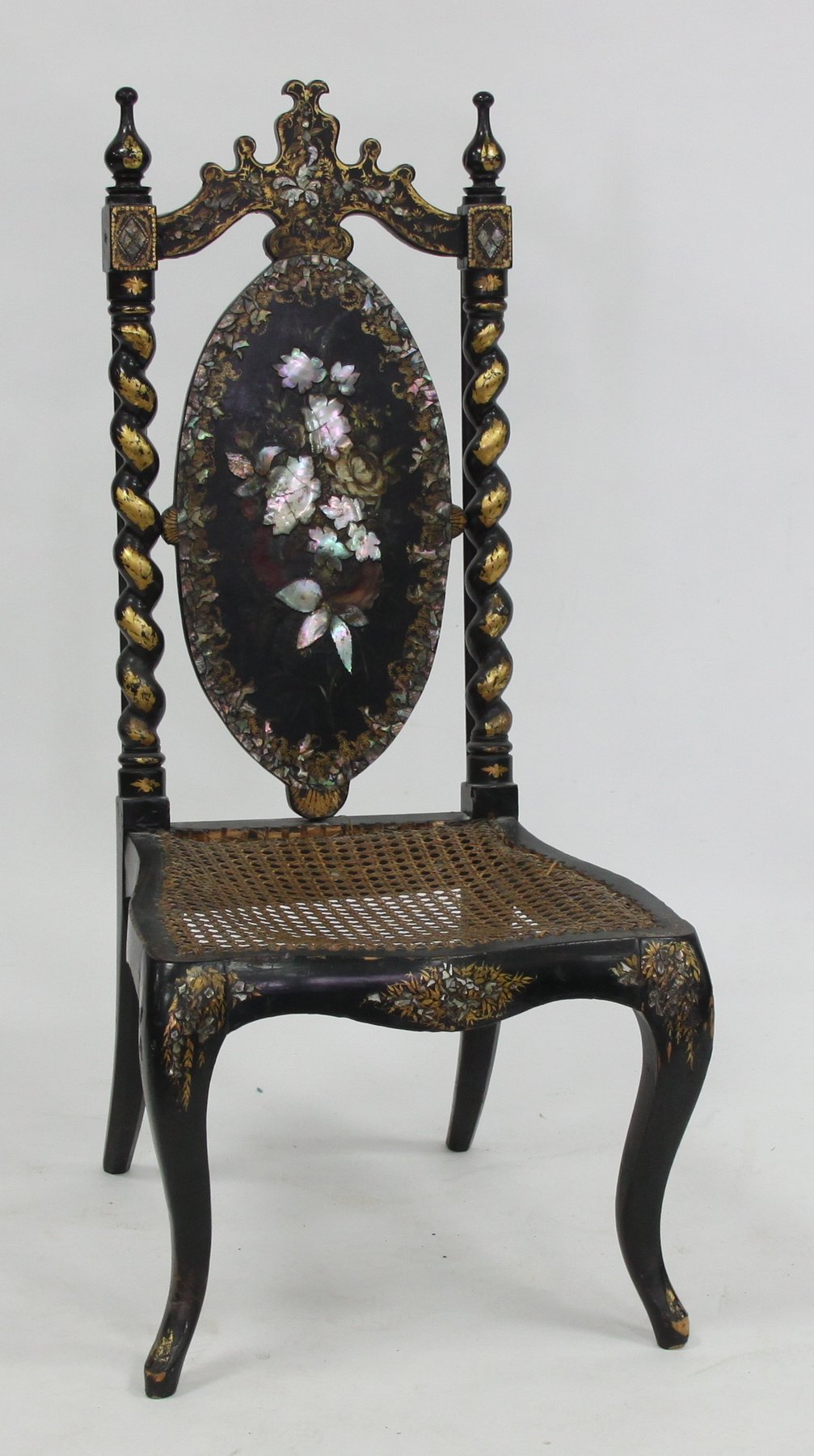 Appraisal: A Victorian papier-m ch chair the oval back flanked by