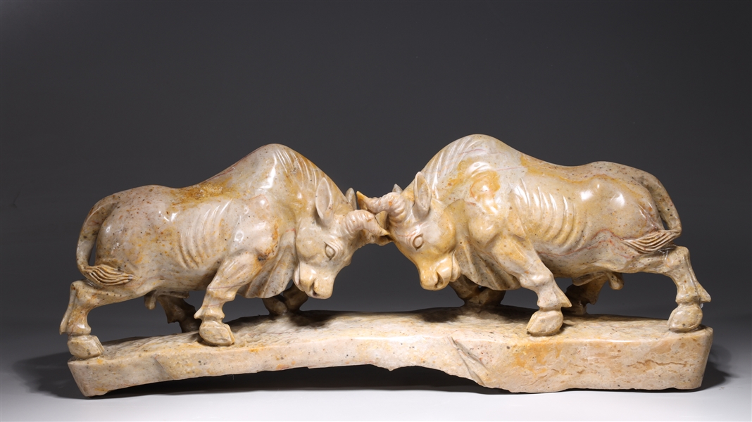 Appraisal: Large Chinese stone carving depicting two bulls fighting overall good