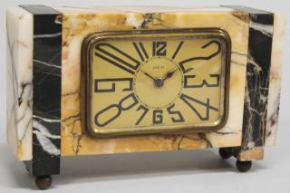 Appraisal: DEP Marble Desk Clock Comprising a black and white marble