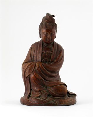 Appraisal: A Chinese bamboo carving of Guanyin kneeling and wearing flowing