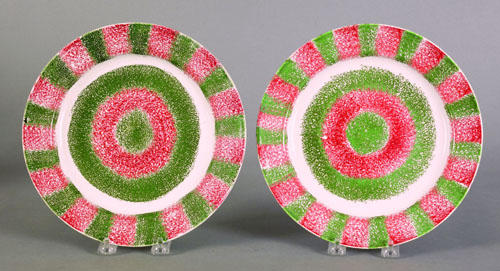 Appraisal: Pair of red and olive green rainbow spatter bull's-eye plates