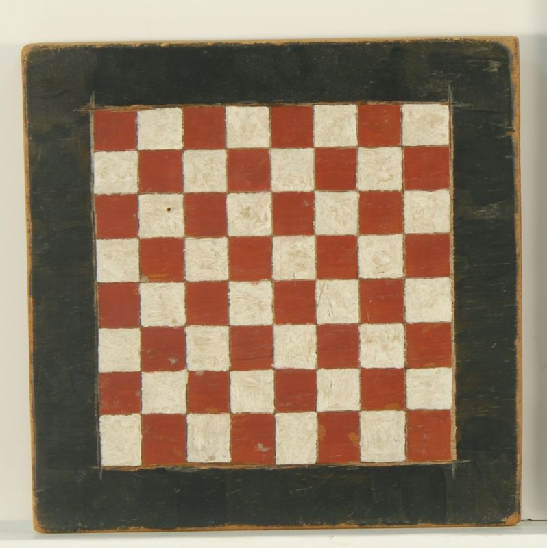 Appraisal: PAINTED WOODEN CHECKERBOARD th CenturyWith red and white squares and