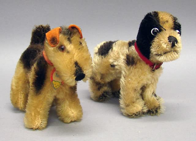 Appraisal: Pair of mohair dogs Terry Terrier with tan mohair black