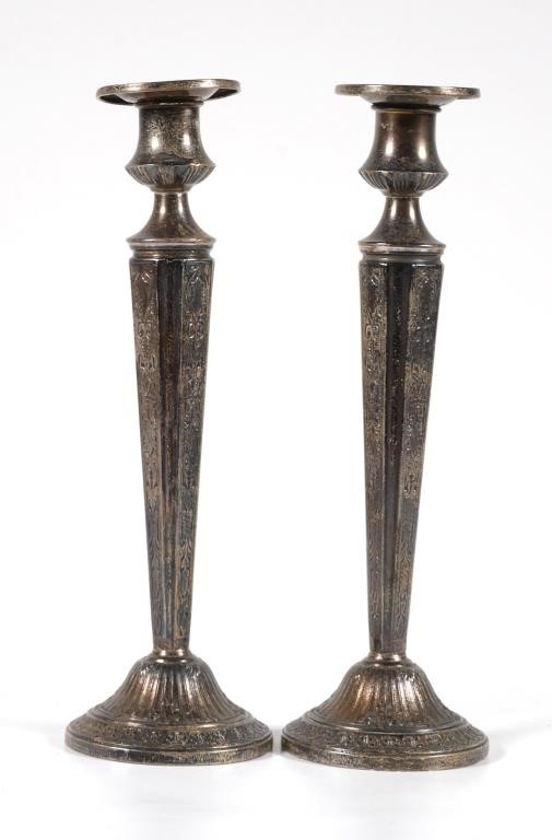 Appraisal: Pair of ornate sterling candlestick holders Tarnished Measure - high