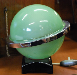 Appraisal: A green glass and chrome Art Deco 'planet' table lamp