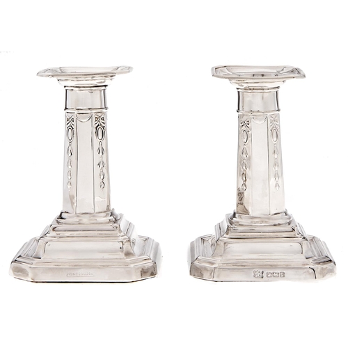 Appraisal: A pair of Edward VII silver dwarf columnar candlesticks cm