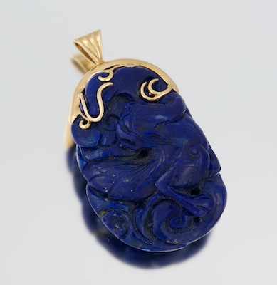 Appraisal: A Large Carved Lapis Pendant k yellow gold bale and