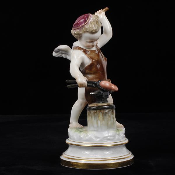 Appraisal: Meissen German porcelain figure of cupid forging a heart modeled