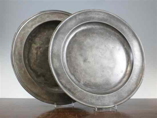 Appraisal: Two pewter dishes th century with reeded rims one by