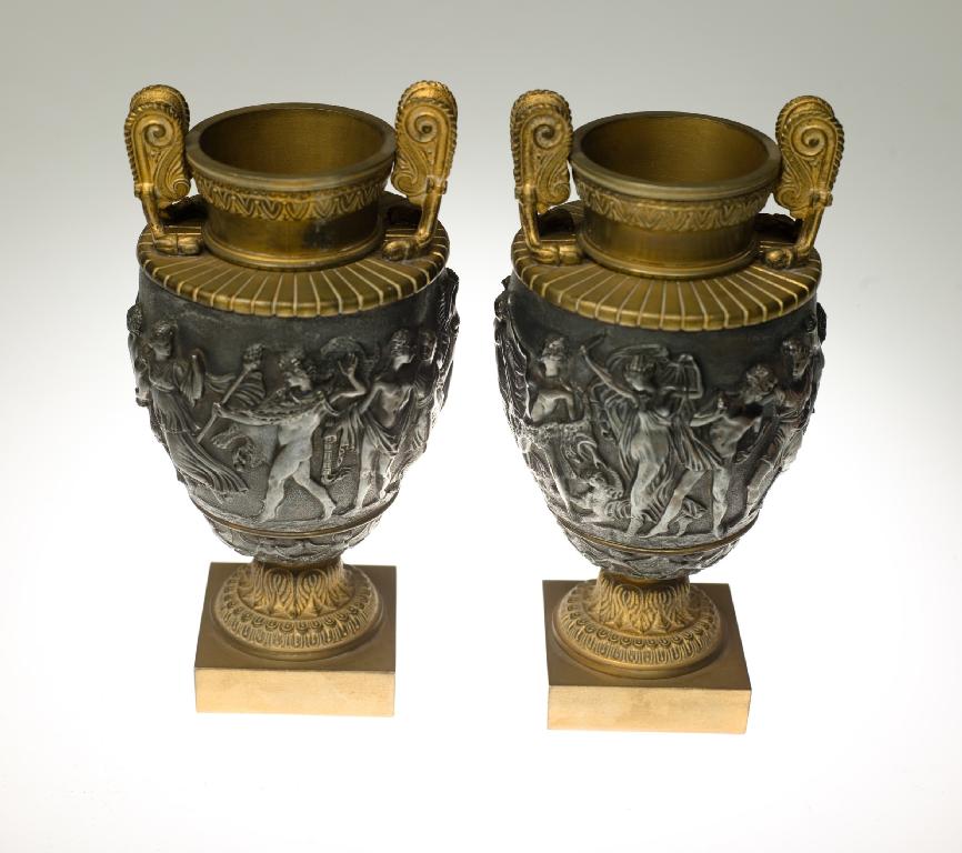 Appraisal: PAIR OF GILT- AND PATINATED METAL TWO-HANDLED VASES IN EMPIRE