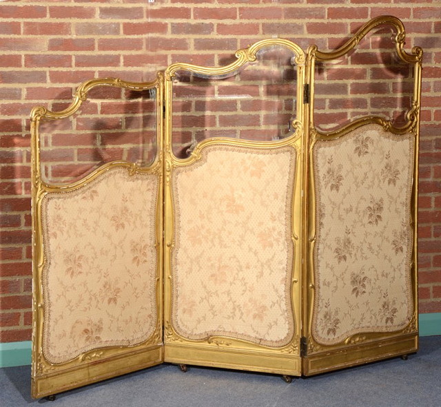 Appraisal: A FRENCH GILTWOOD THREE FOLD DRAUGHT SCREEN with scroll decoration