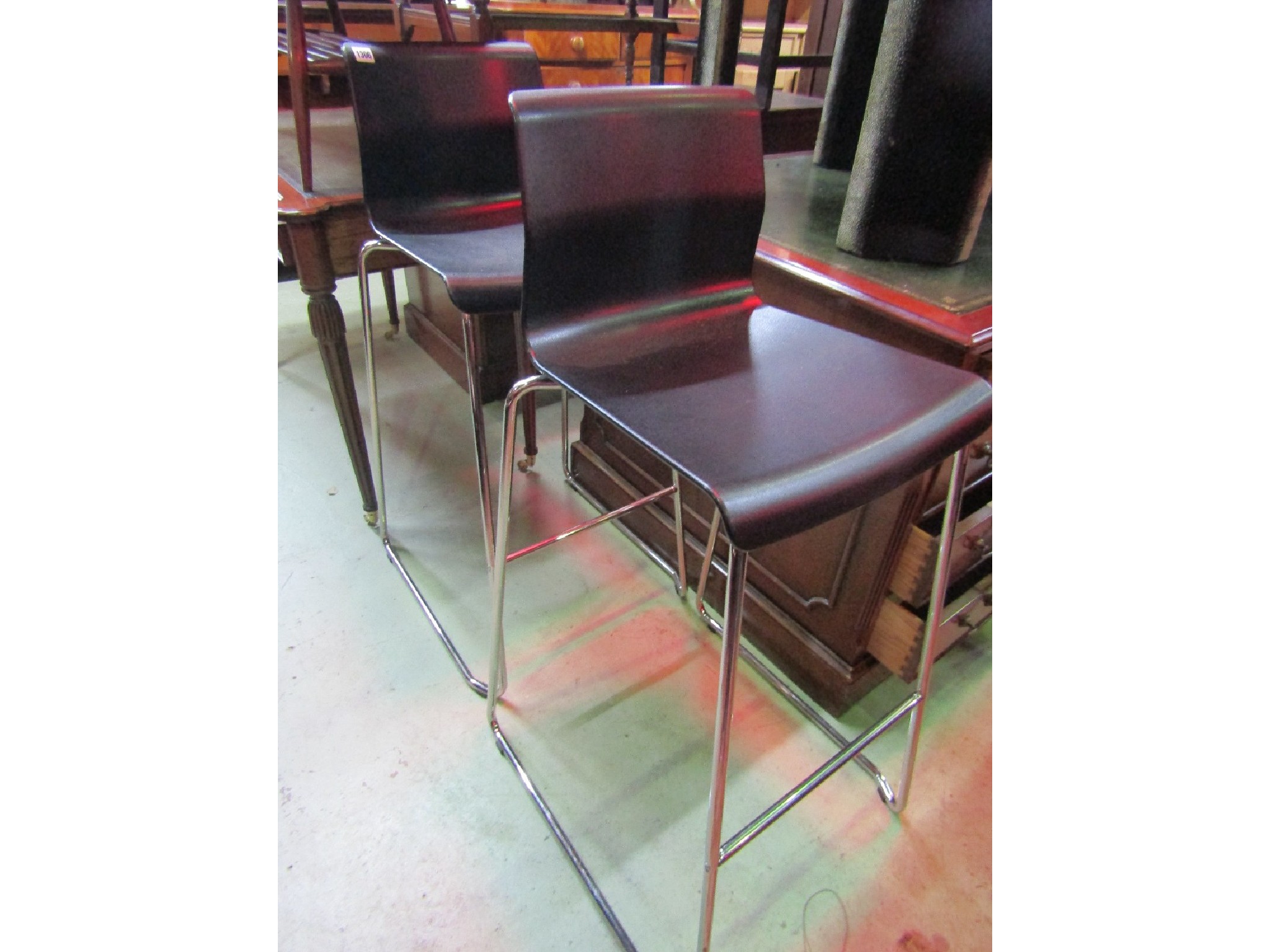 Appraisal: A pair of contemporary bar stools high chairs with ebonised