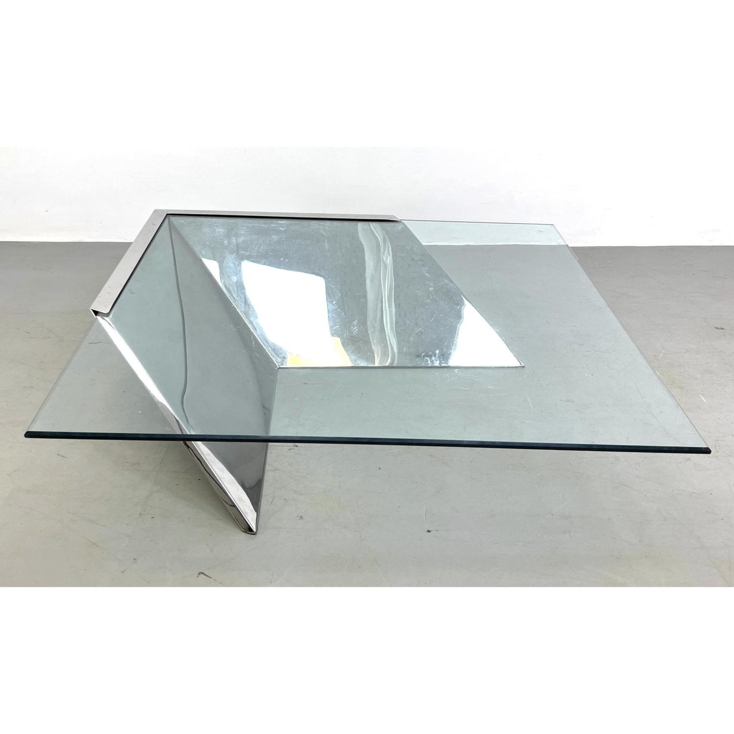 Appraisal: J Wade Beam Brueton Coffee Table A chrome and glass