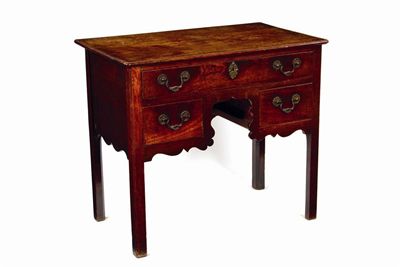 Appraisal: An early George III mahogany lowboy with a moulded edge