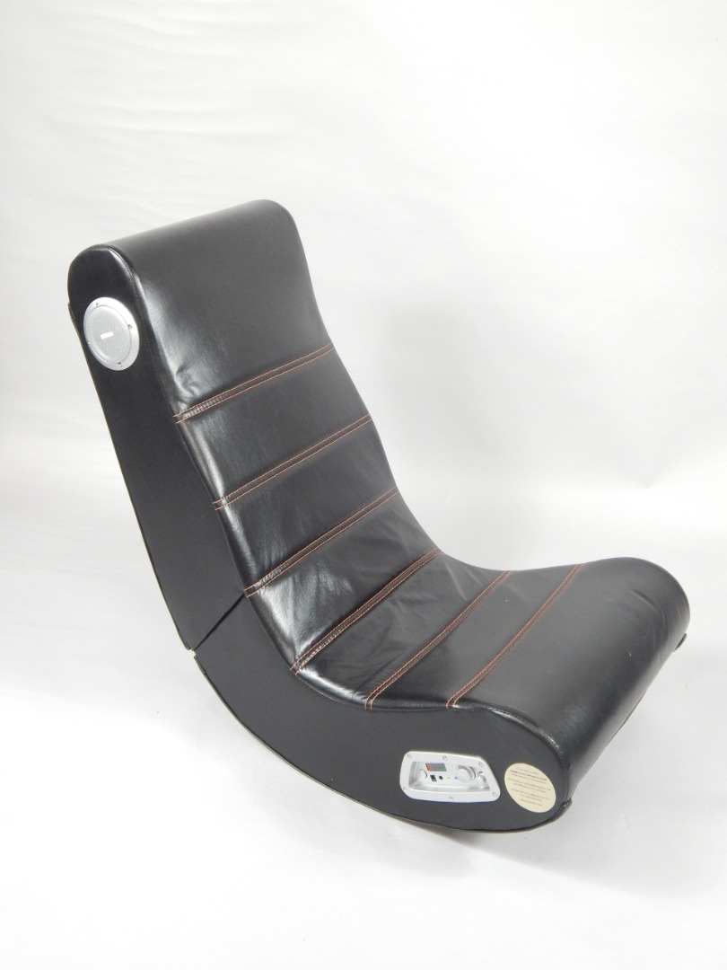 Appraisal: A Rocker black leather gaming chair with built in sound