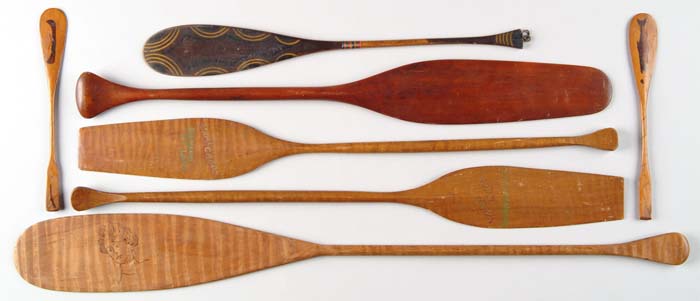 Appraisal: LOT OF SEVEN CARVED AND DECORATED MINIATURE CANOE PADDLES Lot