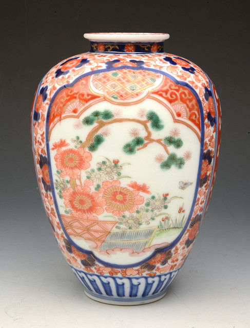 Appraisal: A JAPANESE IMARI OVOID FORM VASE with panels of chrysanthemums