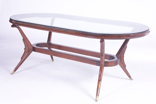 Appraisal: ITALIAN Dining table with oval glass top and oval stretcher