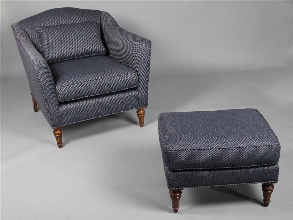 Appraisal: ENGLISH STYLE CLUB CHAIR WITH OTTOMAN navy blue grey textured