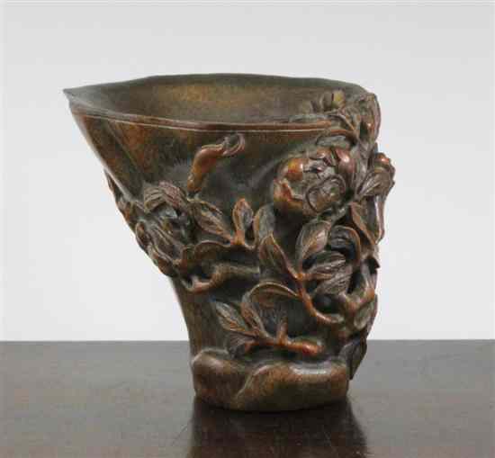 Appraisal: A Chinese bamboo libation cup carved in high relief and