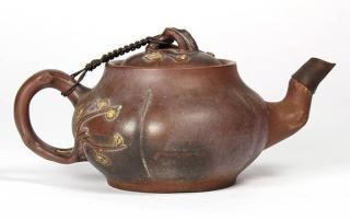 Appraisal: Chinese Zisha Teapot Chinese zisha ceramic teapot the compressed lobed