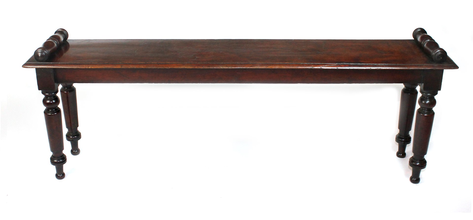 Appraisal: An early th century mahogany window seat with turned end