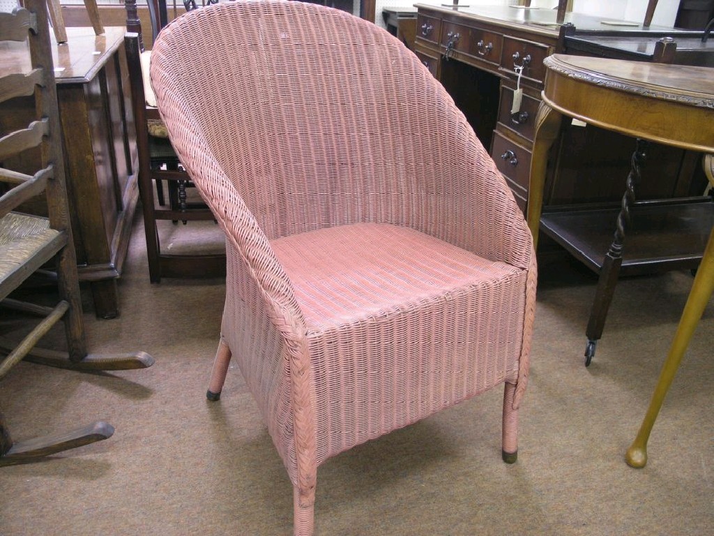 Appraisal: A Lloyd Loom pink sprayed armchair