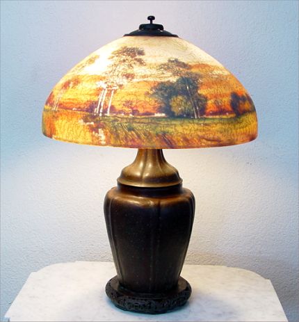 Appraisal: HANDEL REVERSE PAINTED LAMP WITH LANDSCAPE SHADE Chipped ice domical