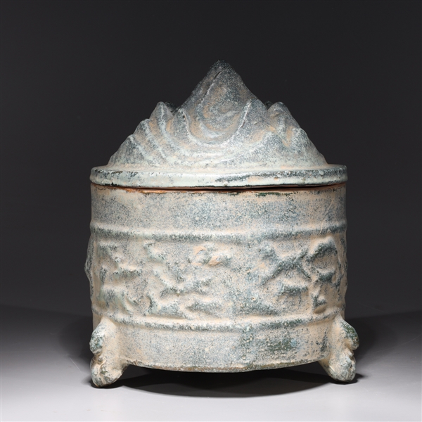 Appraisal: Chinese hill topped covered tripod censer with molded designs to