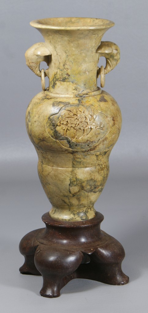 Appraisal: Carved stone vase with ring and elephant head handles h