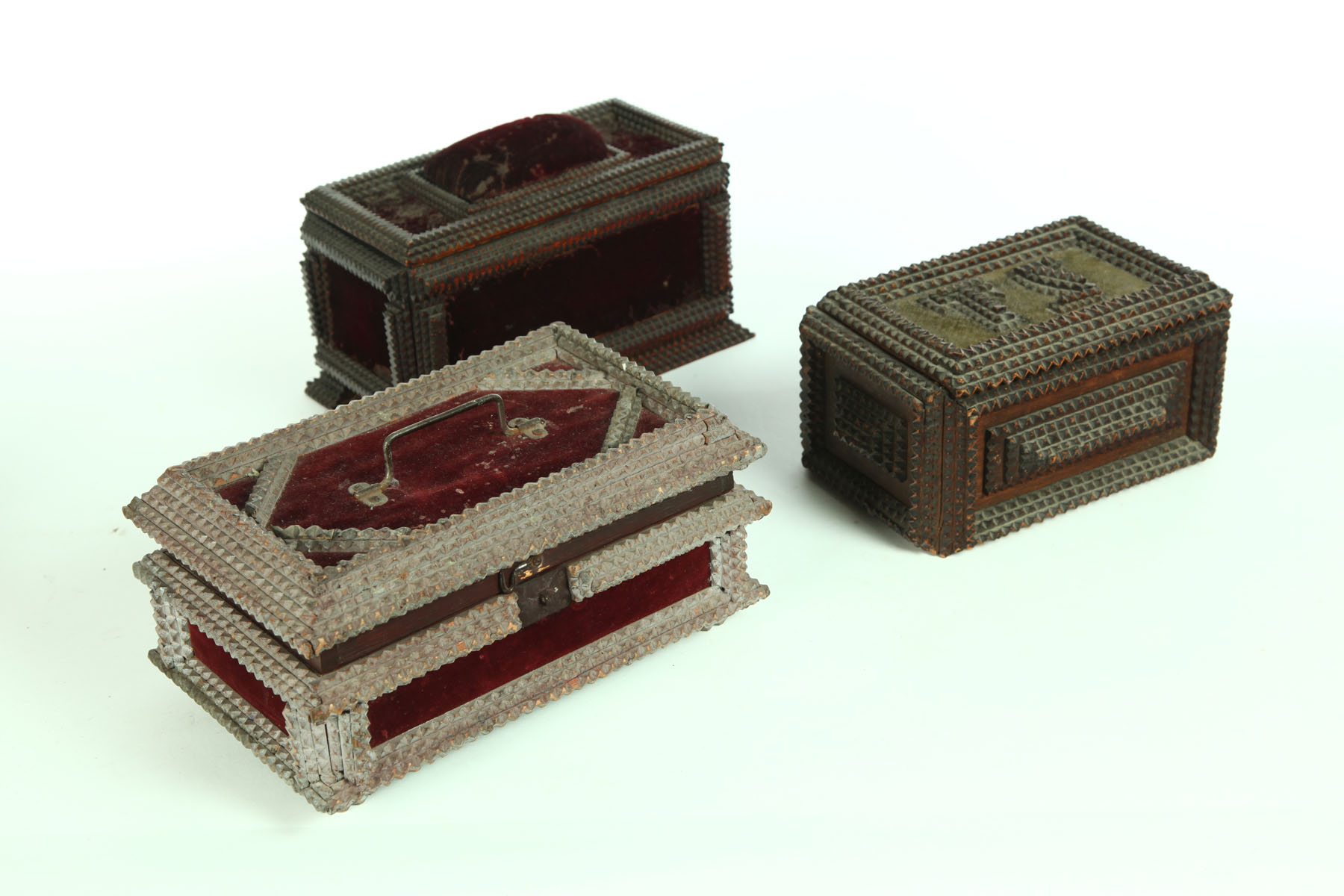 Appraisal: THREE TRAMP BOXES American early th century Jewelry boxes two