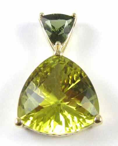 Appraisal: CITRINE AND GREEN TOURMALINE PENDANT k yellow gold set with