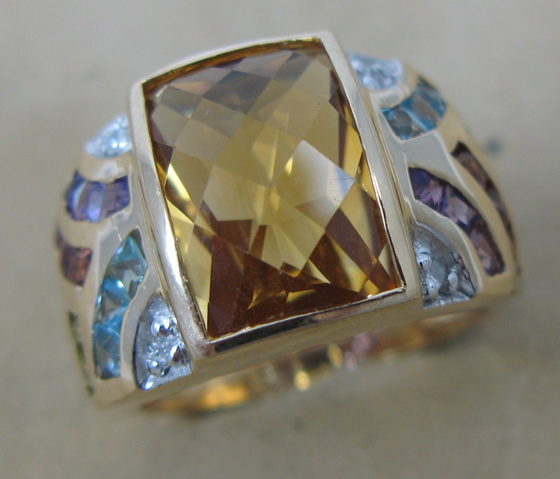 Appraisal: CITRINE AND MULTI-COLOR GEMSTONE RING K yellow gold setting the