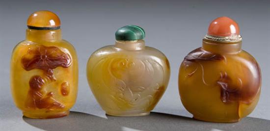 Appraisal: Group of three agate snuff bottles Late th early th