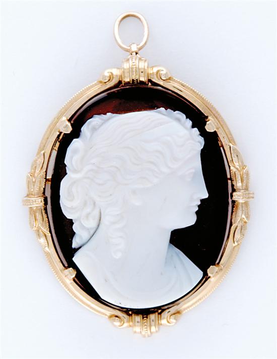 Appraisal: Portrait cameo brooch pendant female portrait held in K yellow