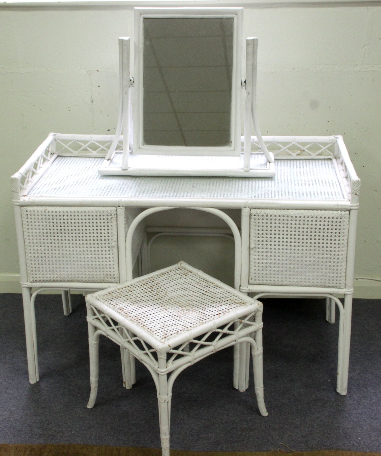 Appraisal: A cane and bamboo dressing table and mirror with white